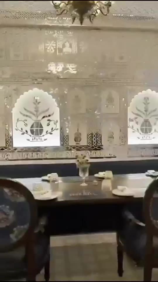 Arched dining alcove with set tables